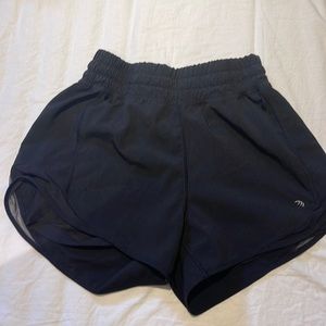 MPG - Pocket Running Shorts with tights underneath in XS